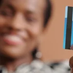 lady holding magstripe campus card