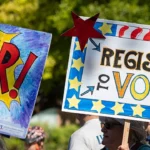 Register to vote signs