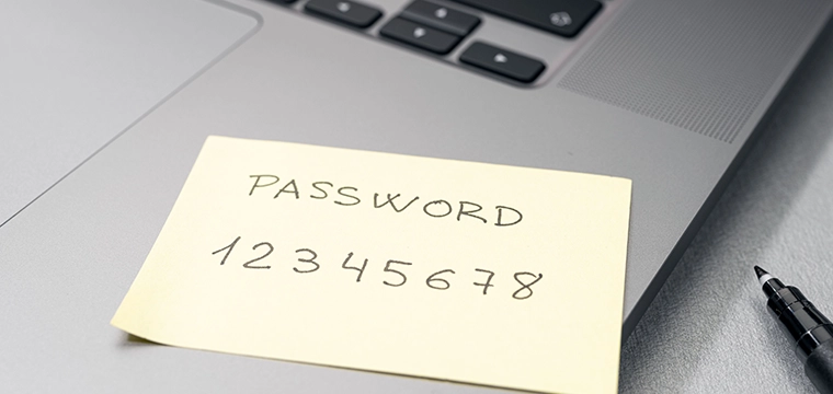 Password written on sticky note