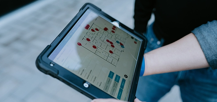 SiteOwl tablet used in the field by a technician