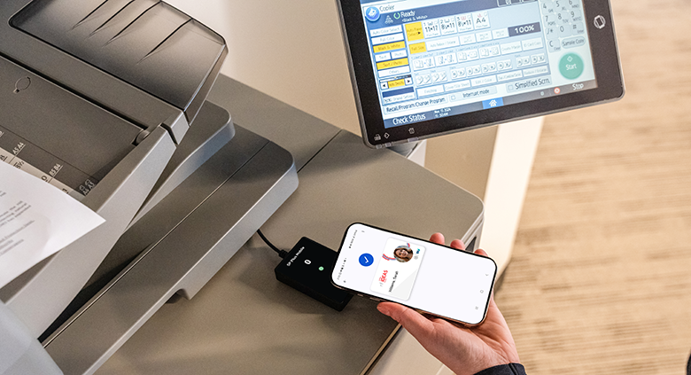 Phone being used at printer
