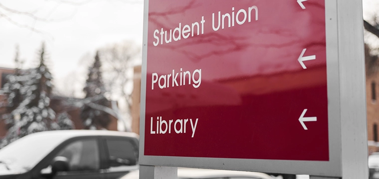 Sign pointing to parking area